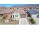 Aerial view of a single-Gathering home showcasing the tile roof and desert landscaping at 12686 E Pivot Peak --, Gold Canyon, AZ 85118