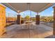 Community barbecue area featuring shaded picnic tables and a grill for outdoor cooking and entertaining at 12686 E Pivot Peak --, Gold Canyon, AZ 85118