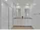 Modern bathroom with dual sinks, a glass-enclosed shower, and stylish fixtures at 12686 E Pivot Peak --, Gold Canyon, AZ 85118