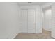 Bedroom showcasing closet with sliding doors, carpeted flooring, and light-colored walls at 12686 E Pivot Peak --, Gold Canyon, AZ 85118