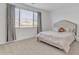 Serene bedroom features a plush bed, soft carpeting, and a large window with natural light at 12686 E Pivot Peak --, Gold Canyon, AZ 85118