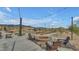 Inviting outdoor fire pit area with Adirondack chairs, perfect for evening gatherings and enjoying the community atmosphere at 12686 E Pivot Peak --, Gold Canyon, AZ 85118