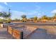 Community horseshoe area with well-maintained sand pit for social gatherings and outdoor entertainment at 12686 E Pivot Peak --, Gold Canyon, AZ 85118