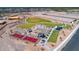 Aerial view of a community park featuring shaded seating and recreational games at 12686 E Pivot Peak --, Gold Canyon, AZ 85118