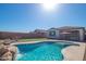 Inviting pool featuring a waterfall and built in seating at 12686 E Pivot Peak --, Gold Canyon, AZ 85118