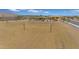 A beautiful community volleyball court surrounded by grass at 12686 E Pivot Peak --, Gold Canyon, AZ 85118