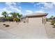 Charming single Gathering home with a tile roof, two car garage, and low maintenance desert landscaping at 15542 W Cypress Point Dr, Surprise, AZ 85374