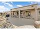 Covered patio with ample seating, perfect for enjoying the desert landscape and outdoor living at 15542 W Cypress Point Dr, Surprise, AZ 85374