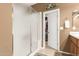 Bright bathroom featuring a glass shower stall, and access to a walk-in closet at 1805 E Atole Pl, Queen Creek, AZ 85140