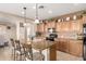 Spacious kitchen featuring granite countertops and stainless steel appliances at 1805 E Atole Pl, Queen Creek, AZ 85140