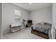 Cozy bedroom with a window, gray carpet, and neutral walls providing a comfortable retreat at 18400 E Donato Dr, Gold Canyon, AZ 85118