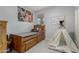 bedroom featuring a twin bed and a play tent creating a playful and inviting atmosphere at 18400 E Donato Dr, Gold Canyon, AZ 85118