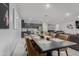 Stylish dining room open to kitchen and living spaces at 18400 E Donato Dr, Gold Canyon, AZ 85118