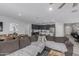 Open concept living space with a seamless flow between the living room, kitchen, and dining areas at 18400 E Donato Dr, Gold Canyon, AZ 85118