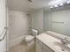 Clean bathroom featuring a shower-tub combo and a vanity with granite countertops at 1942 S Emerson -- # 217, Mesa, AZ 85210