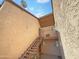 Exterior view showcasing stairs, landings, and building details with natural light at 1942 S Emerson -- # 217, Mesa, AZ 85210