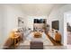 Bright living room with neutral tones, plush seating, a ceiling fan, and sliding glass doors at 1942 S Emerson -- # 217, Mesa, AZ 85210