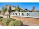 Elegant community entrance sign with lush landscaping and modern design, creating a sophisticated feel at 1950 E Lantana Dr, Chandler, AZ 85286