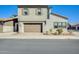 Exterior view of a two-story home showcasing its well-maintained facade and two-car garage at 1950 E Lantana Dr, Chandler, AZ 85286