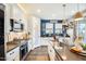 Modern kitchen with stainless steel appliances, a center island, and a stylish coffee bar area at 1950 E Lantana Dr, Chandler, AZ 85286