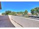 Exterior balcony offers views of the surrounding neighborhood and the community amenities at 1980 N Santa Fe Ct, Casa Grande, AZ 85122