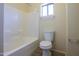 Clean bathroom with tub, shower, and toilet at 1980 N Santa Fe Ct, Casa Grande, AZ 85122