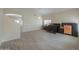 Spacious living room featuring vaulted ceiling, tile floors, recessed lighting, and neutral paint at 1980 N Santa Fe Ct, Casa Grande, AZ 85122