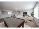 Upstairs game room featuring comfortable seating area and a pool table at 22473 W Woodlands Ave, Buckeye, AZ 85326