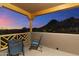 Balcony with stunning sunset views and cozy seating offers an outdoor escape at 24019 N 112Th Pl, Scottsdale, AZ 85255