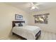 Cozy bedroom with a queen-sized bed and a picturesque view from the window at 24019 N 112Th Pl, Scottsdale, AZ 85255