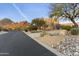 Desert landscape with a circular driveway at 24019 N 112Th Pl, Scottsdale, AZ 85255