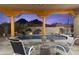 Enjoy outdoor views from the patio with easy access to the pool and water feature at 24019 N 112Th Pl, Scottsdale, AZ 85255