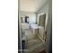 Bathroom featuring dual sinks, bathtub, a glass shower, and wood look tile flooring at 25035 N 63Rd Dr, Phoenix, AZ 85083