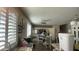 Inviting living space with natural light, a neutral color palette and hardwood floors at 25035 N 63Rd Dr, Phoenix, AZ 85083