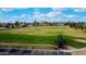 Sprawling golf course, community, and blue sky at 25820 S Saddletree Dr, Sun Lakes, AZ 85248