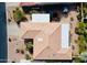 Overhead view of home with a tile roof, desert landscaping, and a private backyard at 25820 S Saddletree Dr, Sun Lakes, AZ 85248