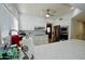 Well-lit kitchen with stainless steel appliances and white cabinets at 25820 S Saddletree Dr, Sun Lakes, AZ 85248