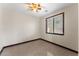 Cozy bedroom featuring a ceiling fan and natural light from a window at 2925 E Cathy E Dr, Gilbert, AZ 85296