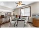 Virtually staged dining room with table, chairs, and rug at 2925 E Cathy E Dr, Gilbert, AZ 85296