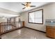 Bright dining room with window views and a ceiling fan at 2925 E Cathy E Dr, Gilbert, AZ 85296