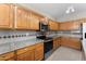 This kitchen features plenty of cabinet space, stainless steel appliances, and stone countertops at 2925 E Cathy E Dr, Gilbert, AZ 85296