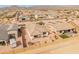 Aerial view of the neighborhood with mountain views showcasing the community and surrounding homes at 3287 N 197Th Ln, Buckeye, AZ 85396