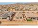 Wide aerial view of the community showcasing the home's location, layout of the backyard, and surrounding neighborhood at 3287 N 197Th Ln, Buckeye, AZ 85396