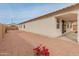 The private backyard includes desert landscaping with a covered patio and is perfect for relaxing outdoors at 3287 N 197Th Ln, Buckeye, AZ 85396