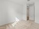 Neutral carpet, bright natural light, and a multi panel door are featured in this room at 3287 N 197Th Ln, Buckeye, AZ 85396