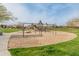 Community playground offers a fun space for children to play, surrounded by lush green grass at 3287 N 197Th Ln, Buckeye, AZ 85396