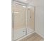 Modern walk-in shower with glass enclosure and designer tile at 3287 N 197Th Ln, Buckeye, AZ 85396