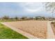 Enjoy friendly matches on the sandy volleyball court, a great amenity for active residents at 3287 N 197Th Ln, Buckeye, AZ 85396