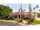 Stunning home showcasing a perfectly manicured front yard with an impressive circular driveway at 3441 S Camellia Pl, Chandler, AZ 85248