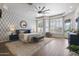 Luxurious main bedroom with elegant decor, a ceiling fan, and lots of natural light at 3441 S Camellia Pl, Chandler, AZ 85248